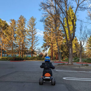Toddler Shredding Tricycle At GooglePlex Parking Lot